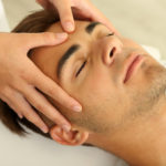 Man having head massage close up